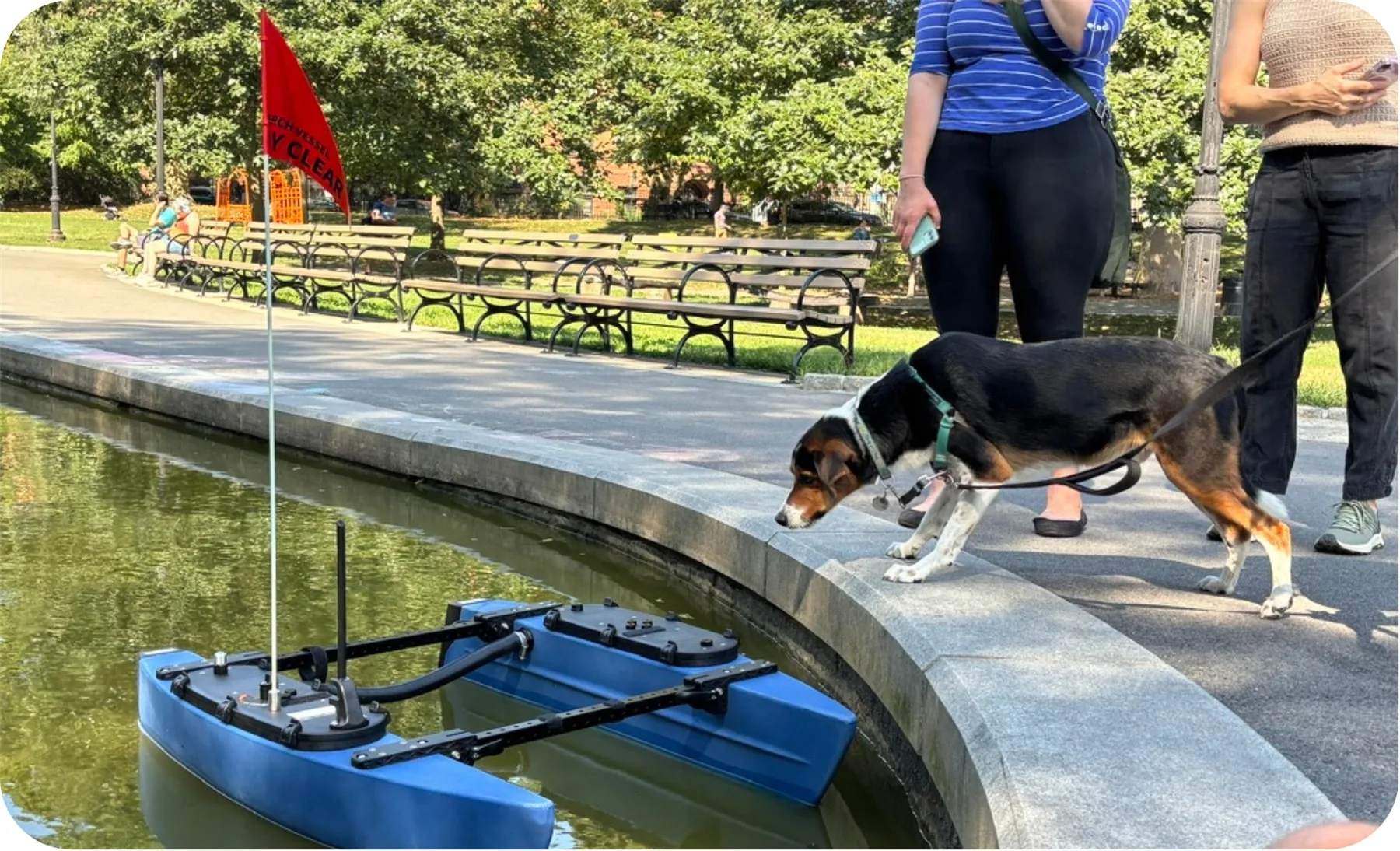 AQUAS unmanned surface vehicle being tested in a park pond