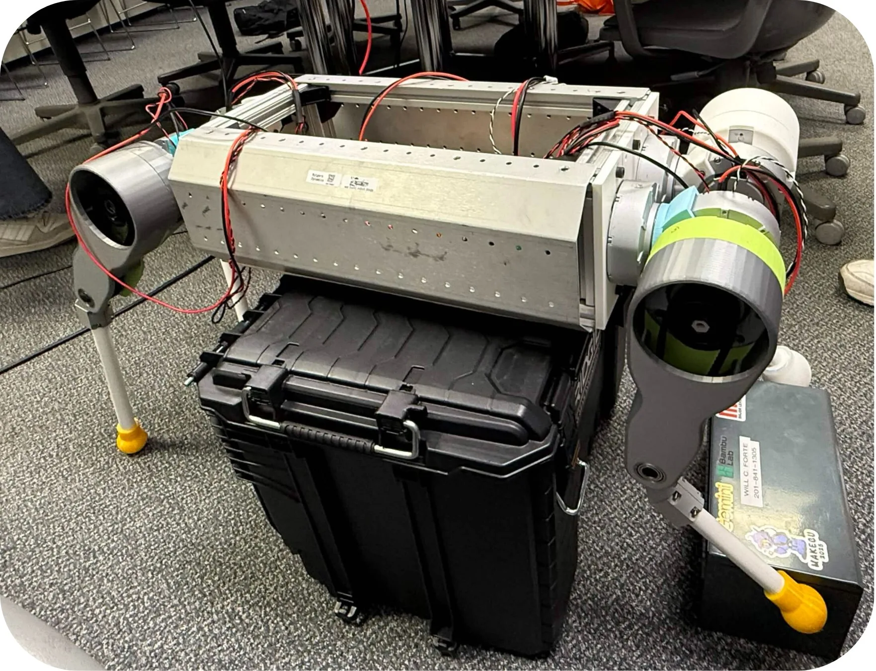 CCBR quadruped robot assembled around a transport case