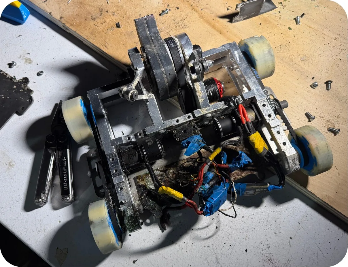 Combat robot opened for repair after a match